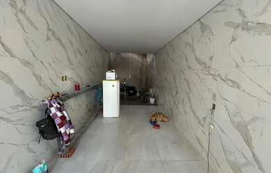 Imagem: A casa possui 3 Dormitórios, 3 Banheiros, 2 Vagas na garagem