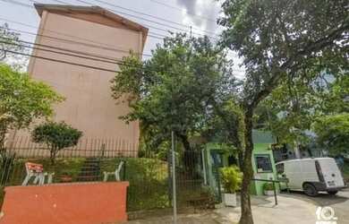 Imagem: O apartamento possui 1 Dormitório, 1 Banheiro, 1 Vaga na garagem