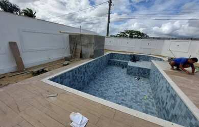 Imagem: A casa em condomínio possui 4 Dormitórios, 5 Banheiros, 4