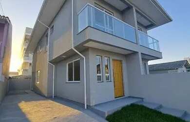 Imagem: A casa possui 3 Dormitórios, 3 Banheiros, 2 Vagas na garagem