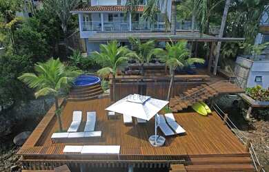 Imagem 2: Casa costeira contemporânea em condomínio exclusivo com heliponto