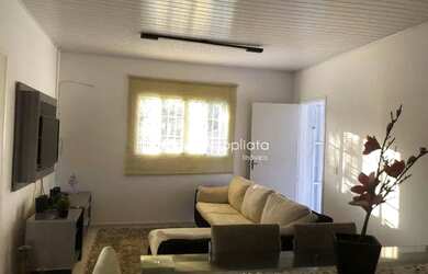 Imagem: A casa possui 3 Dormitórios, 1 Banheiro, 1 Vaga na garagem