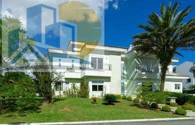 Imagem: A casa em condomínio possui 4 Dormitórios, 5 Banheiros, 5