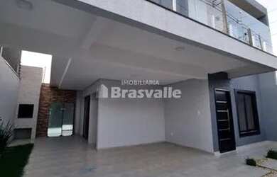 Imagem: A casa possui 3 Dormitórios, 2 Banheiros, 3 Vagas na garagem