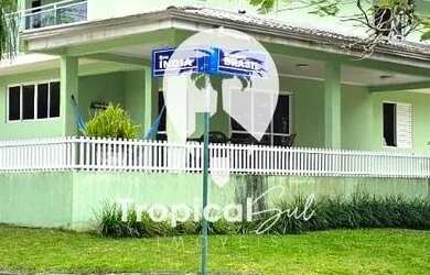 Imagem: A casa em condomínio possui 5 Dormitórios, 5 Banheiros, 5