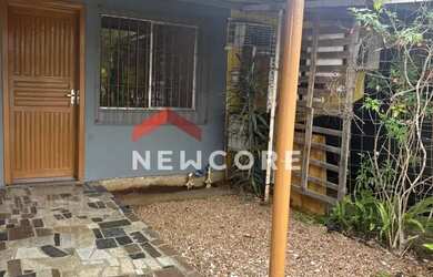 Imagem: A casa possui 2 Dormitórios, 1 Banheiro, 1 Vaga na garagem