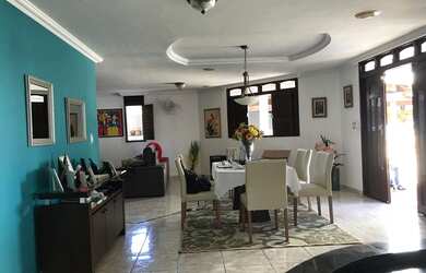 Imagem: A casa possui 3 Dormitórios, 5 Banheiros, 5 Vagas na garagem