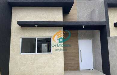 Imagem: A casa possui 3 Dormitórios, 1 Banheiro, 2 Vagas na garagem