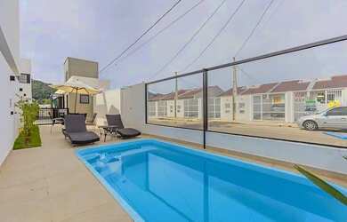 Imagem: A casa em condomínio possui 2 Dormitórios, 2 Banheiros, 1