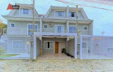 Imagem: A casa possui 2 Dormitórios, 2 Banheiros, 2 Vagas na garagem