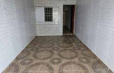 Imagem: A casa possui 3 Dormitórios, 2 Banheiros, 1 Vaga na garagem