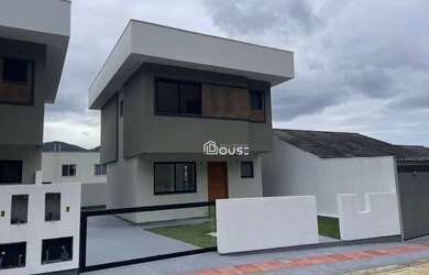 Imagem: A casa possui 3 Dormitórios, 3 Banheiros, 1 Vaga na garagem