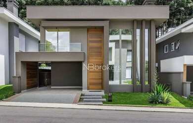 Imagem: A casa em condomínio possui 4 Dormitórios, 5 Banheiros, 3