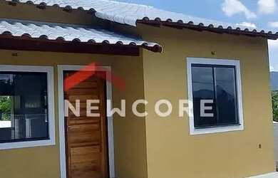 Imagem: A casa possui 2 Dormitórios, 2 Banheiros, 3 Vagas na garagem