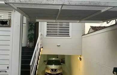 Imagem: A casa possui 3 Dormitórios, 5 Banheiros, 3 Vagas na garagem