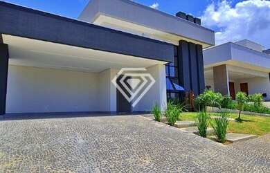 Imagem: A casa em condomínio possui 3 Dormitórios, 4 Vagas na garagem