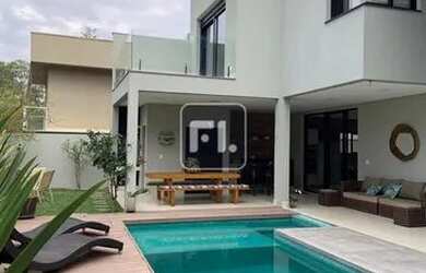 Imagem: A casa em condomínio possui 4 Dormitórios, 5 Banheiros, 4