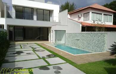 Imagem: A casa em condomínio possui 5 Dormitórios, 5 Banheiros, 4