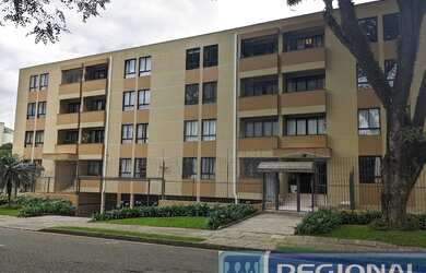 Imagem: O apartamento possui 3 Dormitórios, 1 Banheiro, 1 Vaga na garagem