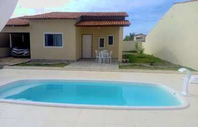 Imagem: A casa possui 3 Dormitórios e 5 Vagas na garagem e está localizado