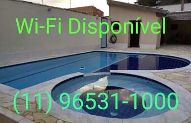 Imagem: A casa possui 3 Dormitórios e 3 Vagas na garagem e está localizado