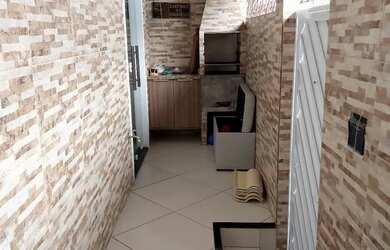 Imagem: A casa possui 2 Dormitórios, 3 Banheiros e está localizado