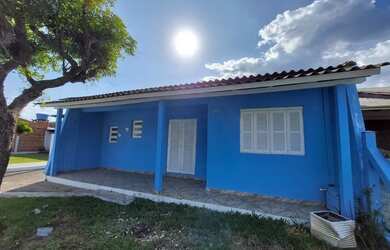 Imagem 3: Casa Tramandai temporada. Acomodam 8 pessoas, 4 Vagas na garageme3 Dormitórios