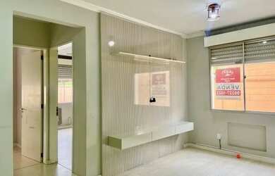 Imagem: O apartamento possui 2 Dormitórios, 1 Banheiro, 1 Vaga na garagem