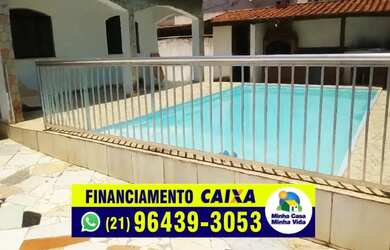 Imagem: A casa possui 5 Dormitórios, 2 Banheiros, 4 Vagas na garagem