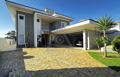 Imagem: A casa em condomínio possui 4 Dormitórios, 5 Banheiros, 5