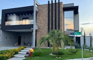 Imagem: A casa em condomínio possui 1 Dormitório, 5 Banheiros, 2 Vagas