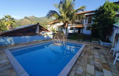 Imagem: A casa em condomínio possui 4 Dormitórios, 4 Banheiros, 5