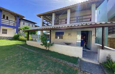 Imagem: A casa possui 4 Dormitórios, 4 Banheiros, 2 Vagas na garagem