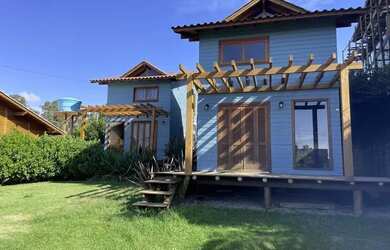 Imagem: A casa possui 1 Dormitório, 1 Banheiro, 450m² de Área e