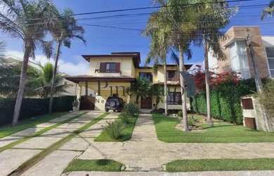 Imagem: A casa em condomínio possui 4 Dormitórios, 5 Banheiros, 4