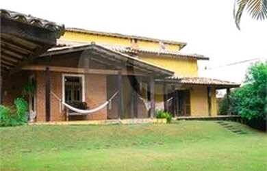 Imagem: A casa possui 5 Dormitórios, 5 Banheiros, 5 Vagas na garagem