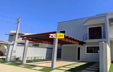 Imagem: A casa em condomínio possui 3 Dormitórios, 4 Banheiros, 2