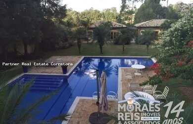 Imagem: A casa em condomínio possui 5 Dormitórios, 5 Banheiros, 3