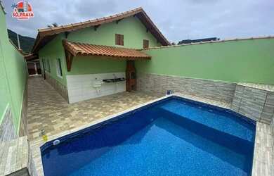 Imagem: A casa possui 2 Dormitórios, 2 Banheiros, 2 Vagas na garagem