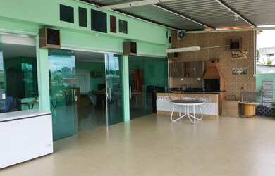 Imagem: A casa possui 5 Dormitórios, 5 Banheiros, 4 Vagas na garagem