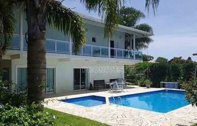 Imagem: A casa em condomínio possui 4 Dormitórios, 5 Banheiros, 5