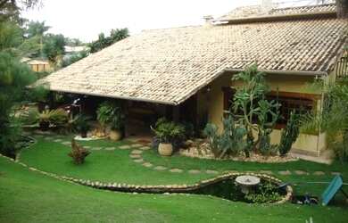 Imagem: A casa em condomínio possui 4 Dormitórios, 2 Banheiros, 2