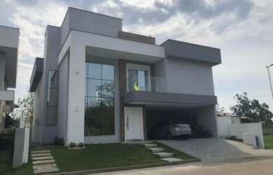 Imagem: A casa em condomínio possui 5 Dormitórios, 5 Banheiros, 2