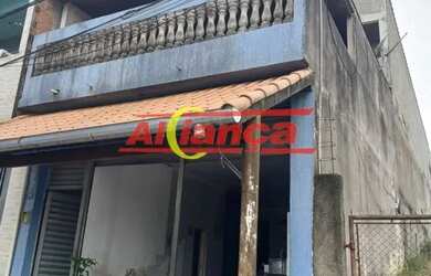 Imagem: A casa possui 4 Dormitórios, 2 Banheiros, 350m² de Área e