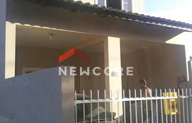 Imagem: A casa possui 4 Dormitórios, 3 Banheiros, 2 Vagas na garagem