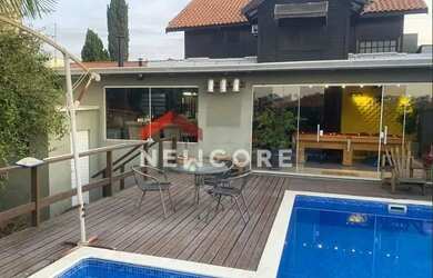 Imagem: A casa em condomínio possui 3 Dormitórios, 4 Banheiros, 5