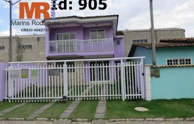 Imagem: A casa possui 5 Dormitórios, 1 Banheiro, 2 Vagas na garagem