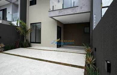 Imagem: A casa possui 2 Dormitórios, 1 Banheiro, 2 Vagas na garagem