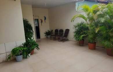 Imagem: A casa possui 4 Dormitórios, 4 Banheiros, 3 Vagas na garagem