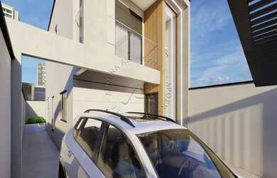 Imagem: A casa possui 3 Dormitórios, 2 Banheiros, 2 Vagas na garagem